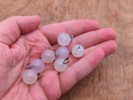 White agate crystal ball pendant with smooth round shape, ideal for jewelry making, from GemstoneGO.