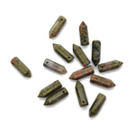 Unakite point hole crystal pendant from GemstoneGO showing a drilled green and pink gemstone crystal pendant on a white background.