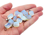 Opalite tumbled crystal pendant from GemstoneGO featuring a smooth, polished love stone with a subtle iridescent glow.