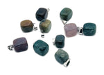 Moss agate tumbled crystal pendant with natural green and brown patterns, showcasing a polished gemstone from GemstoneGO.