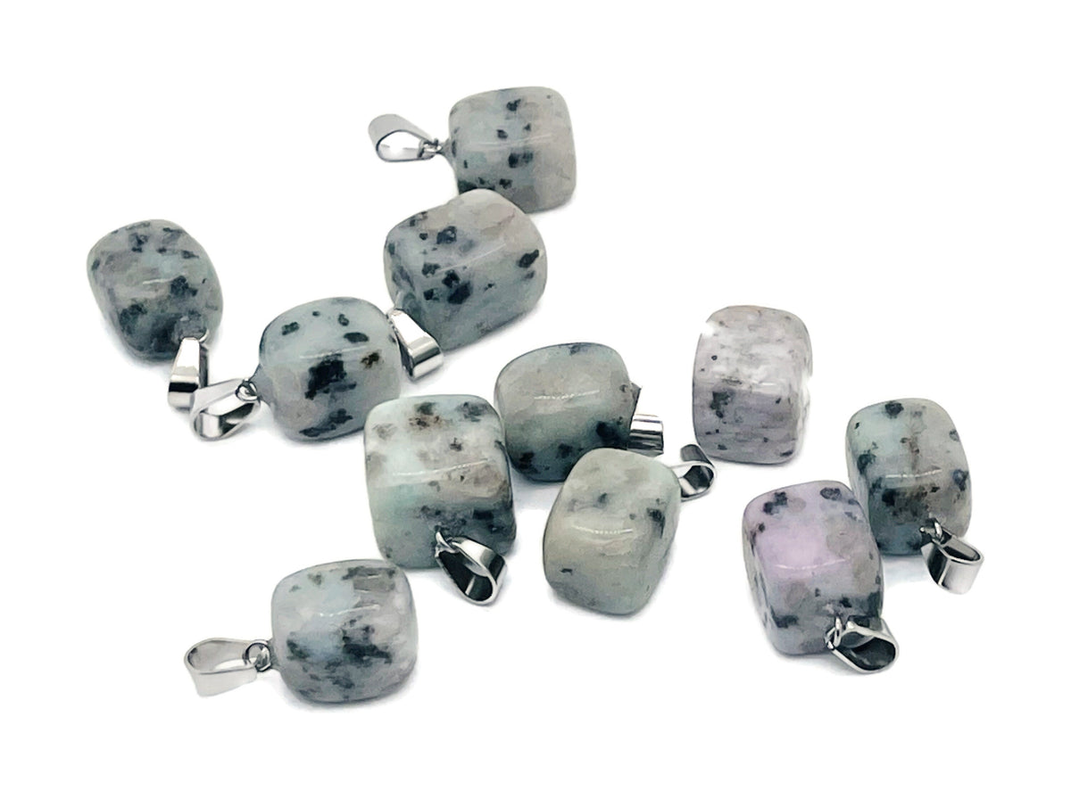 Tumbled gemstone pendant featuring a crystal love stone, from GemstoneGO, with a polished, natural appearance on a jewelry chain