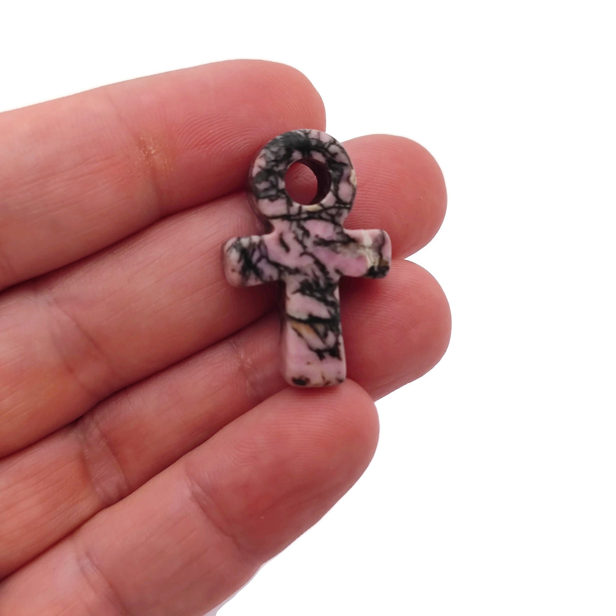Rhodonite Anka crystal carving, gemstone Ankh pendant, 30mm, featuring pink and black stone with intricate design from GemstoneGO