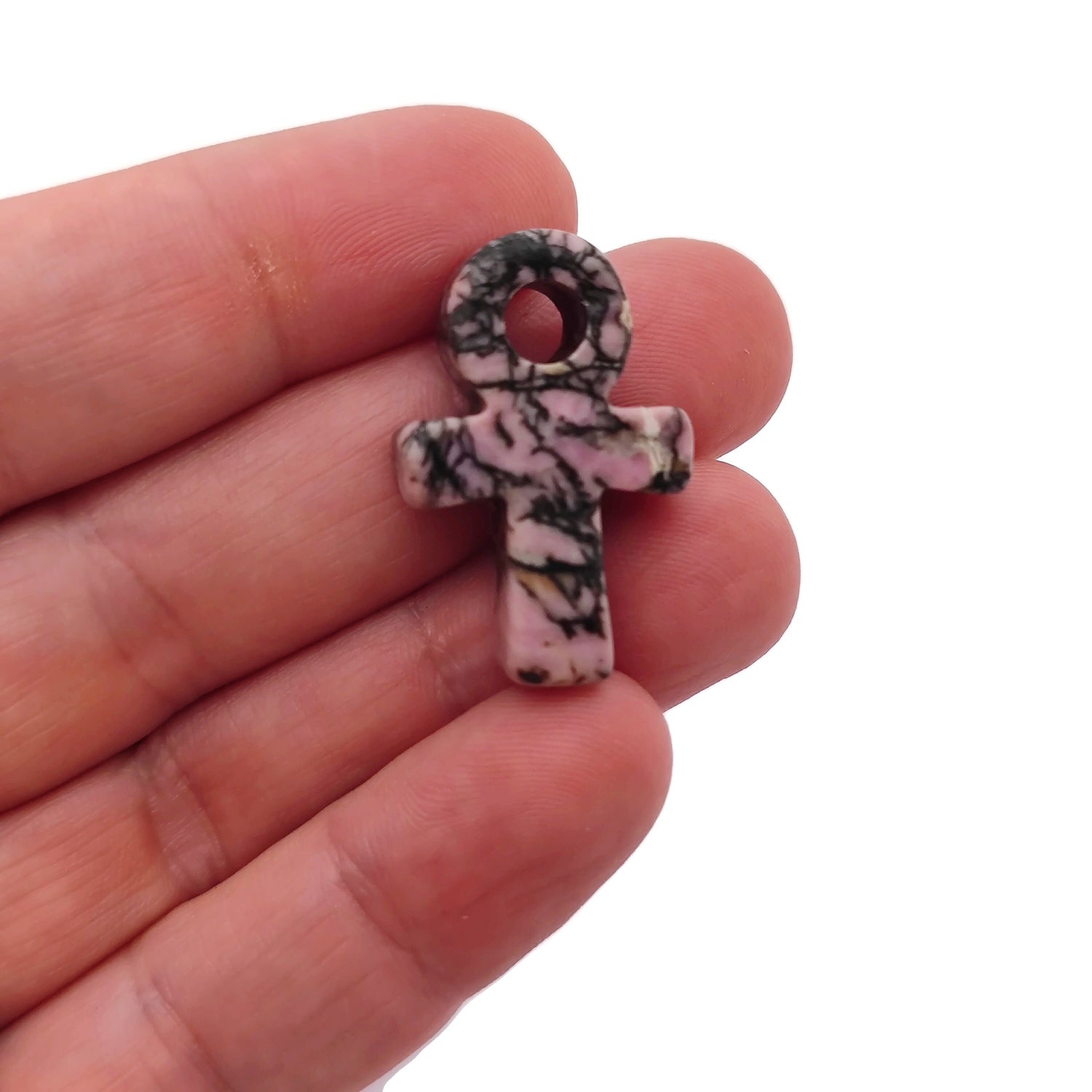 Rhodonite Anka crystal carving, gemstone Ankh pendant, 30mm, featuring pink and black stone with intricate design from GemstoneGO