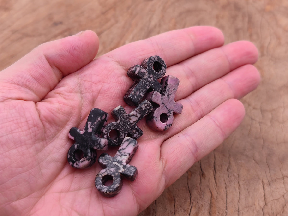 Rhodonite Anka crystal carving, 30mm gemstone Ankh symbol, detailed pink and black stone pendant from GemstoneGO.