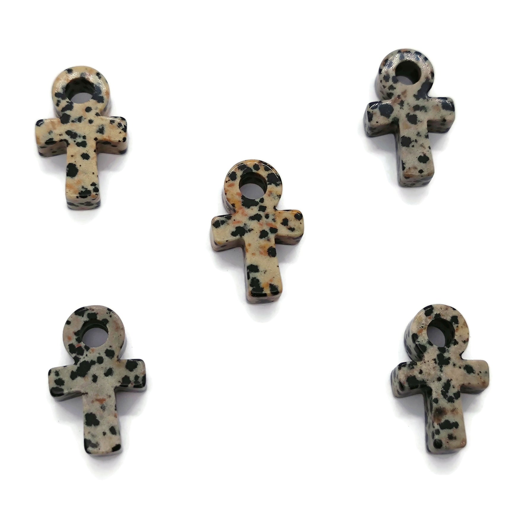 Dalmatian Jasper Anka crystal carving with gemstone ankhs, 30mm size, featuring black and white speckled pattern for spiritual decor