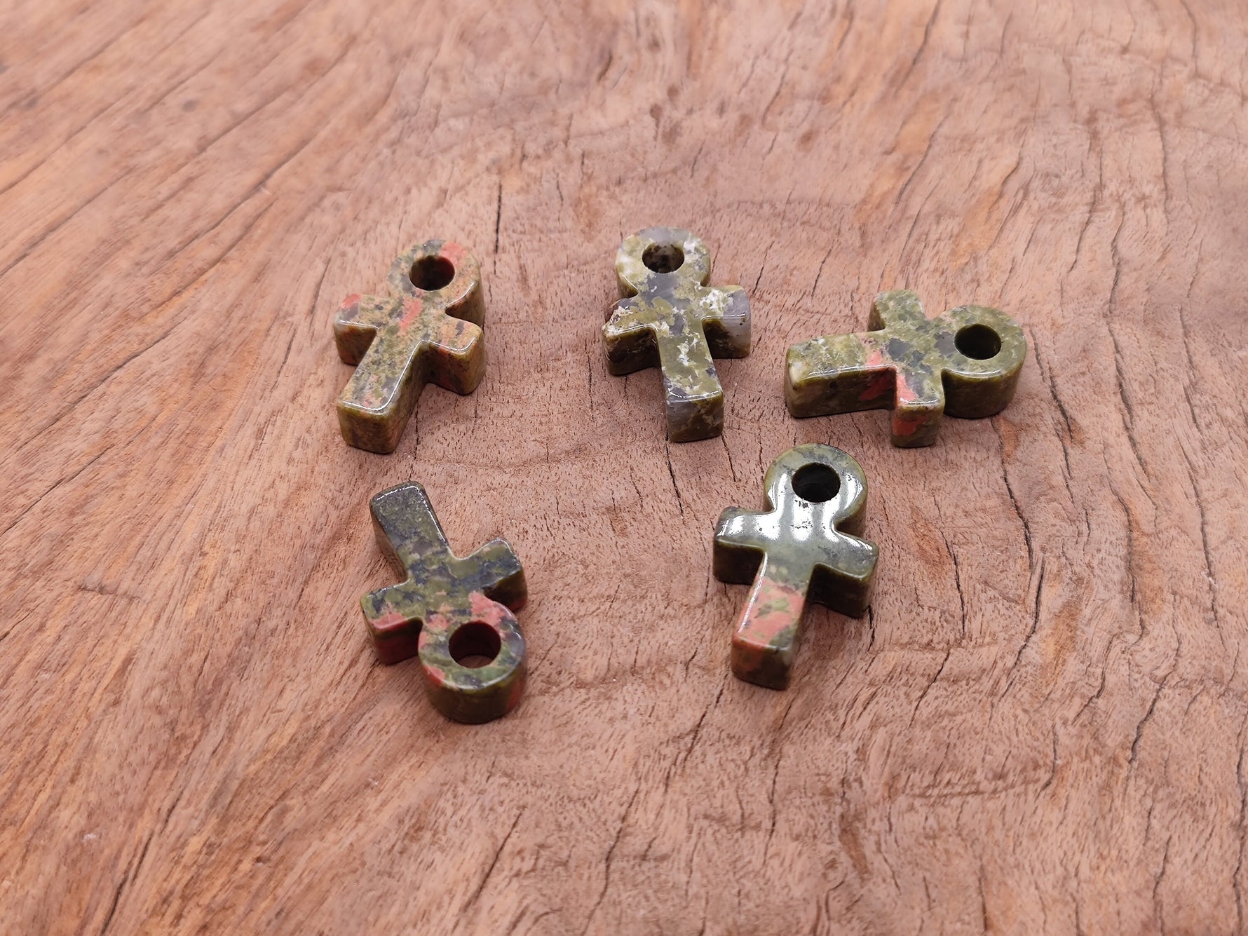 Unakite gemstone Anka crystal carving, 30mm, featuring detailed Ankh design, handcrafted by GemstoneGO for spiritual symbolism.