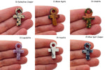 Handmade mini crystal Ankh carvings by GemstoneGO featuring colorful Anka totems on a neutral background.
