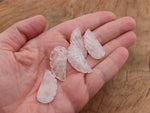 Clear quartz angel wing crystal pendant with hole charm, featuring detailed angel wing design, by GemstoneGO.