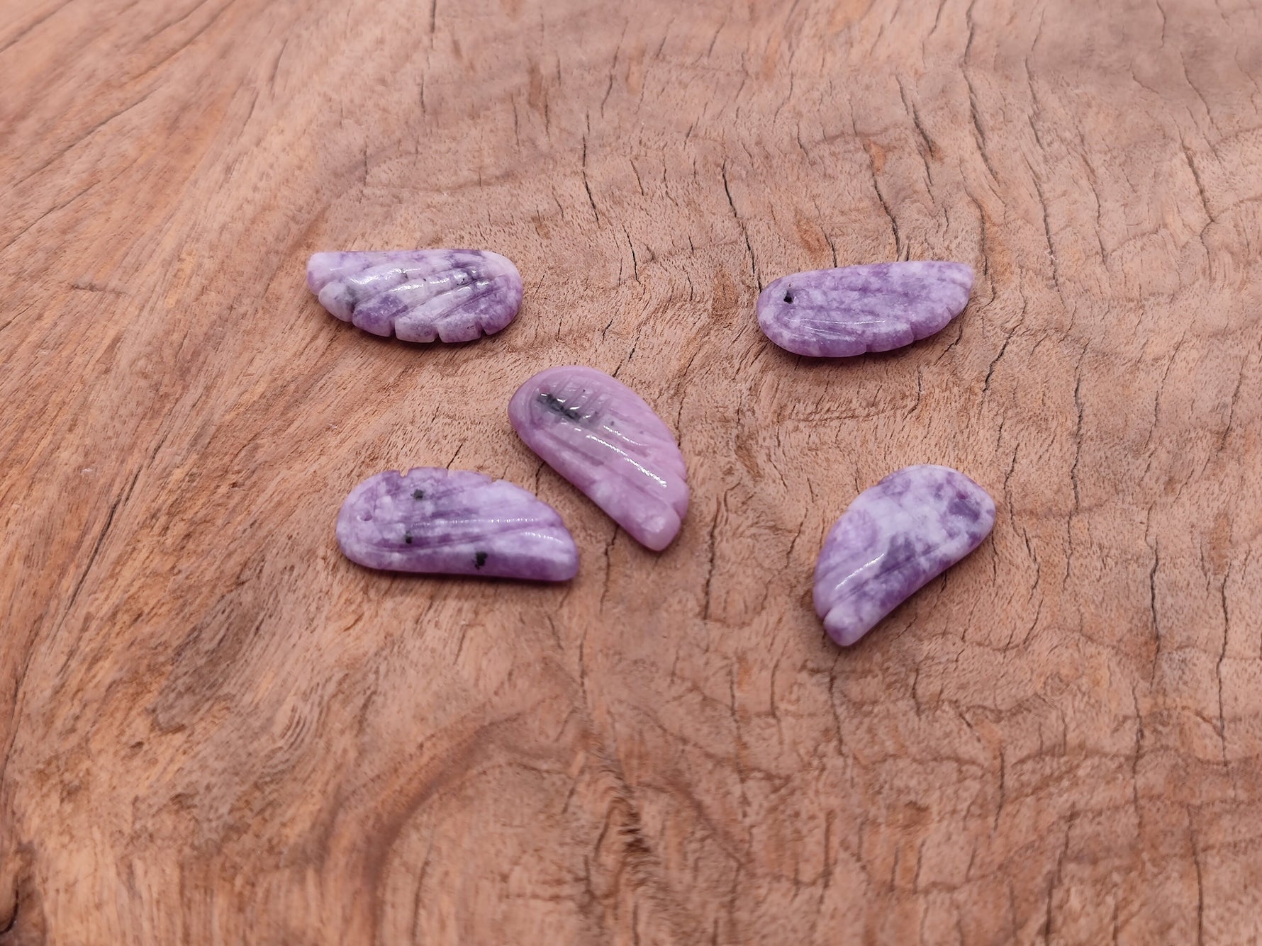 Lepidolite angel wing crystal pendant with hole charm, showcasing purple Lepidolite stone and detailed angel wing design.