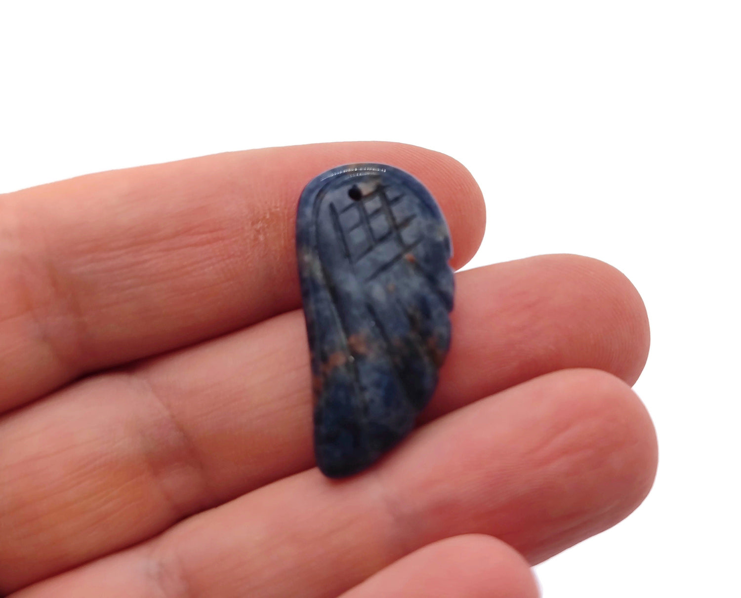 Sodalite angel wing crystal pendant with hole charm, showcasing vibrant blue and white mineral patterns, handcrafted jewelry accessory.