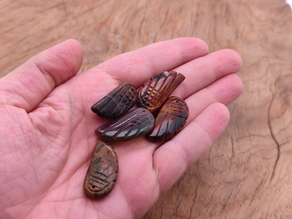 Indian Agate angel wing crystal pendant with hole charm, featuring detailed gemstone wing design from GemstoneGO.