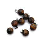 Tige Eye Ball Crystal Pendant by GemstoneGO featuring a round clear crystal ball for jewelry making.
