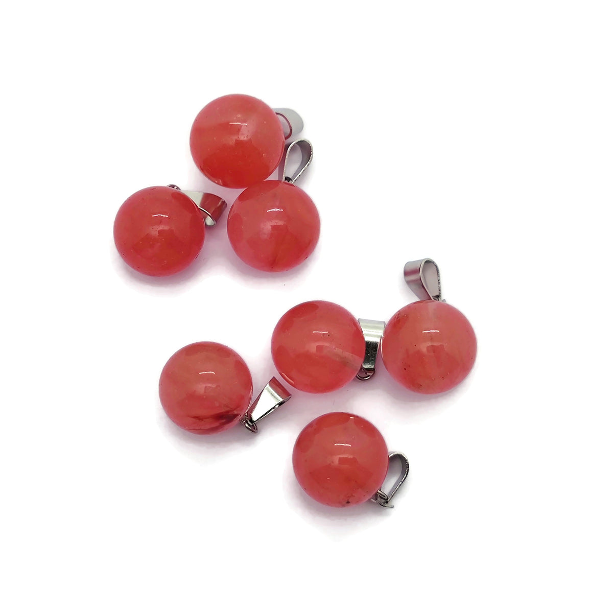 Cherry Quartz crystal ball pendant from GemstoneGO, showcasing a smooth round gemstone suitable for jewelry making.