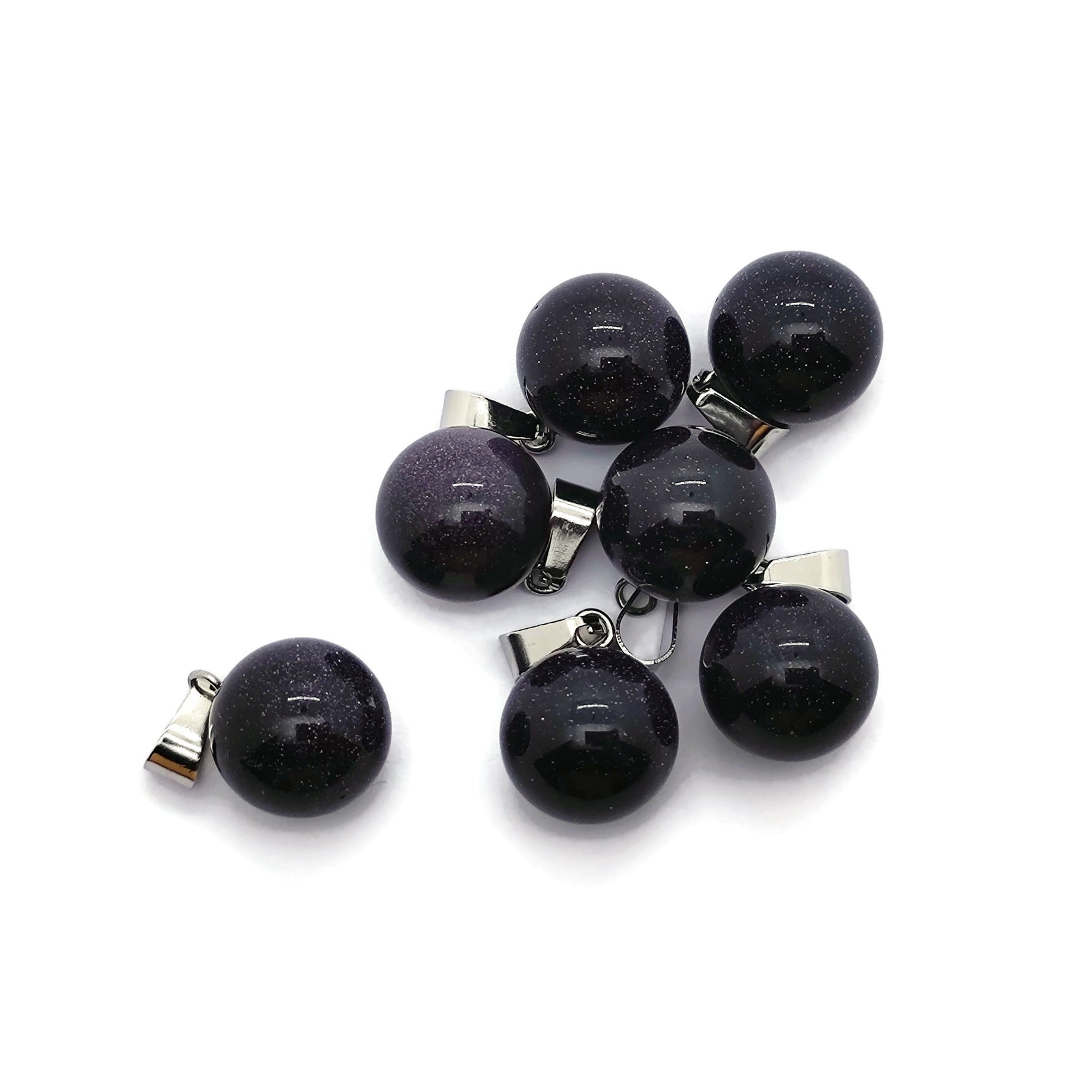 Blue goldstone round crystal pendant with a polished ball design, ideal for jewelry making by GemstoneGO.