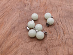 Luminous crystal round ball pendant from GemstoneGO, perfect for jewelry making, showcasing a clear, polished gemstone.