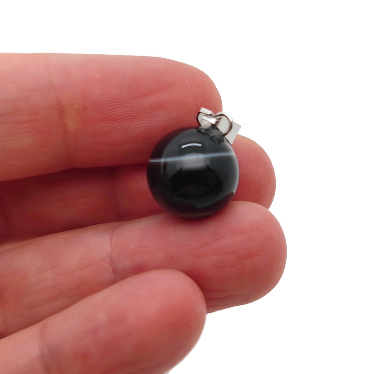Black agate crystal ball pendant, round gemstone jewelry piece from GemstoneGO, ideal for jewelry making and accessories.