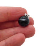 Black agate crystal ball pendant, round gemstone jewelry piece from GemstoneGO, ideal for jewelry making and accessories.