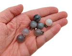 Grey agate crystal ball pendant with smooth round surface, suitable for jewelry making by GemstoneGO.