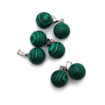 Synthetic malachite ball pendant with a smooth, polished round shape for jewelry making, from GemstoneGO.