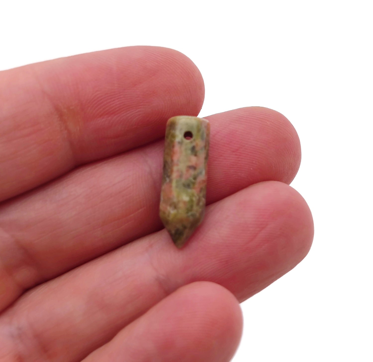Unakite crystal point pendant from GemstoneGO, drilled gemstone with natural green and pink hues, ready for jewelry making.