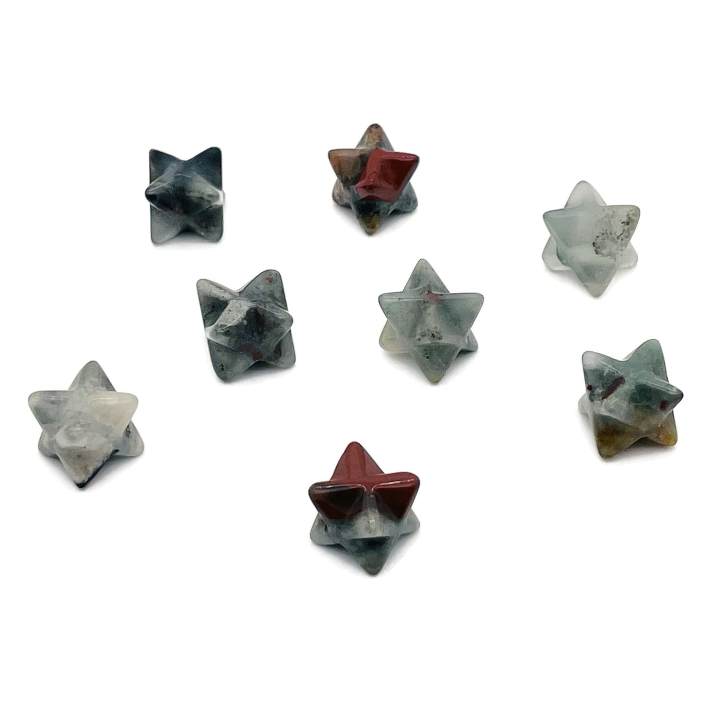 13mm African Bloodstone Merkaba star crystal from GemstoneGO, featuring a vibrant green and red bloodstone with a geometric star shape.