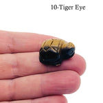 Handmade gemstone crystal turtle figurine, carved animal sculpture measuring 30mm, showcasing intricate details and colorful gemstone textures.