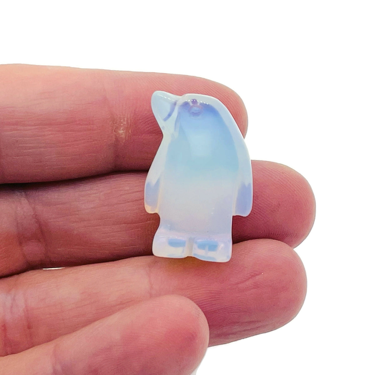 Handmade carved crystal penguin animal figure by GemstoneGO, 30mm size, featuring a detailed, natural gemstone design.