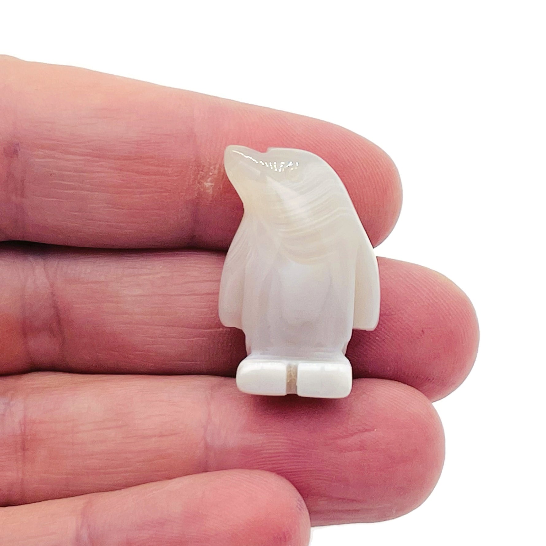 Handmade 30mm gemstone crystal penguin animal figure by GemstoneGO, carved and polished with a mix of colorful crystals.