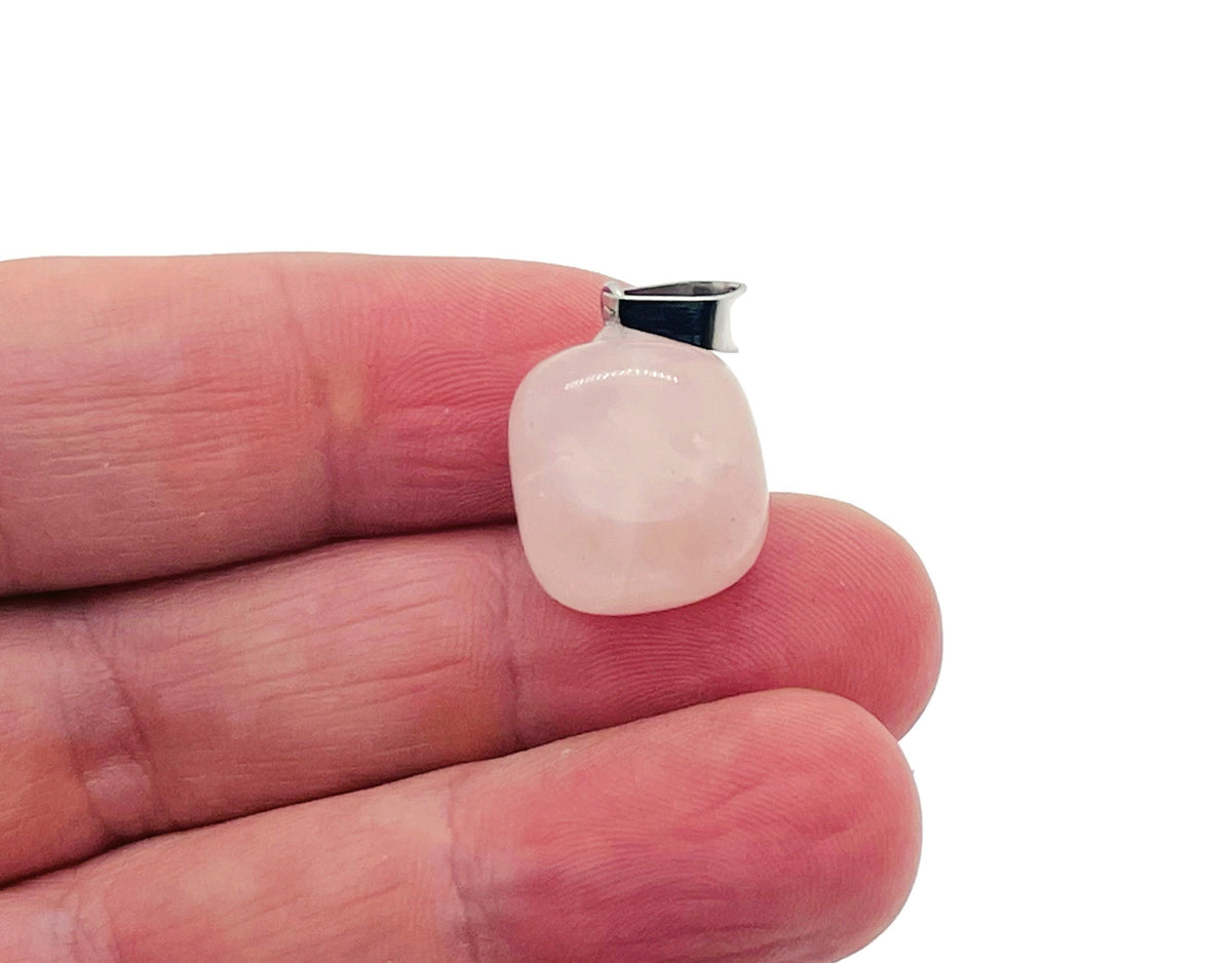 Rose quartz tumbled gemstone pendant from GemstoneGO featuring a smooth, polished pink stone with a silver loop for necklace attachment.