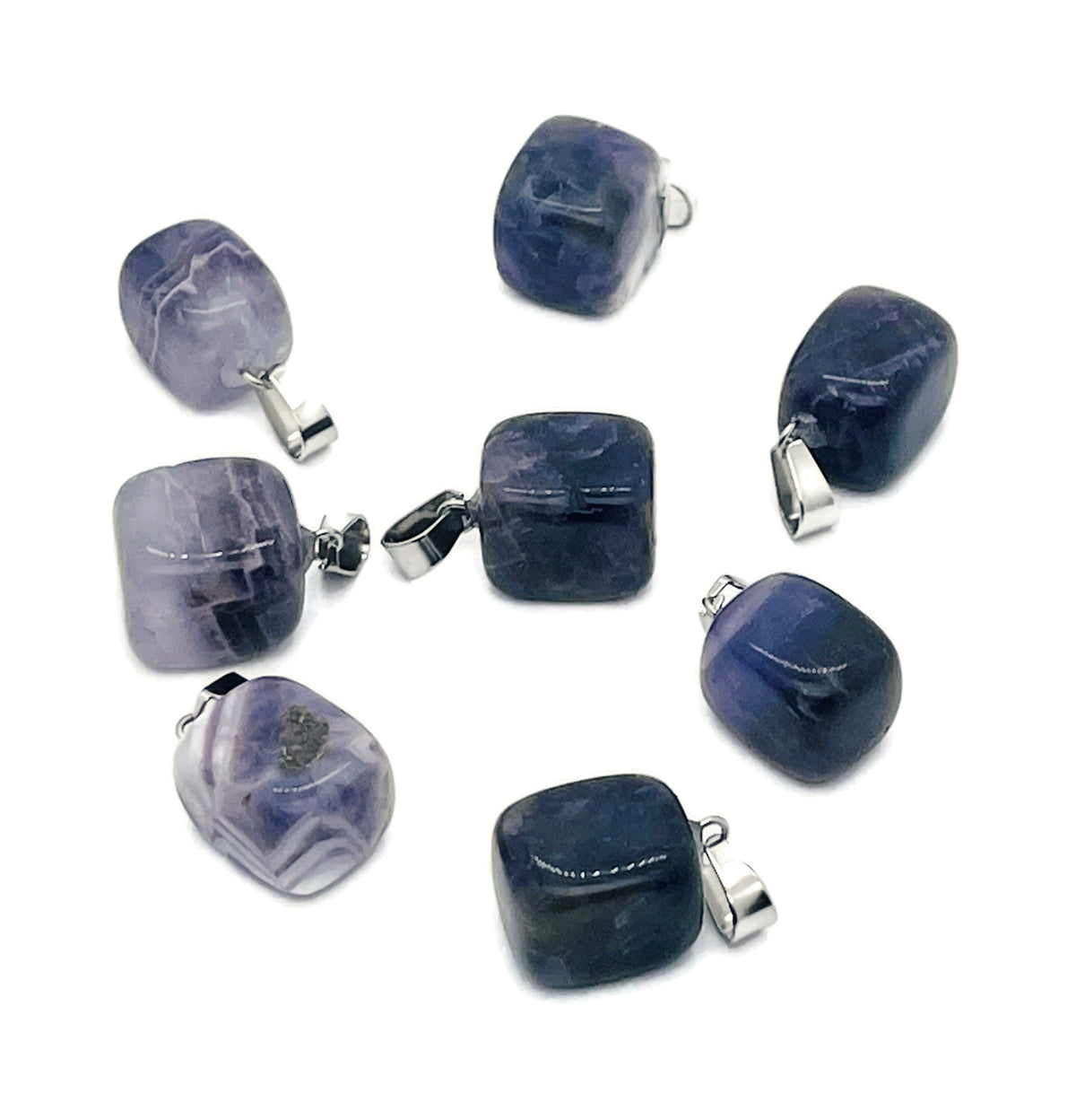 Amethyst tumbled gemstone pendant from GemstoneGO featuring a smooth purple stone with natural variations and a silver bail.