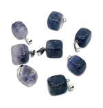 Amethyst tumbled gemstone pendant from GemstoneGO featuring a smooth purple stone with natural variations and a silver bail.