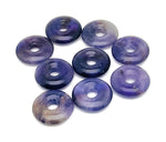 Amethyst crystal donut gemstone from GemstoneGO, 20mm Pi Stone with purple amethyst color and smooth polished surface.