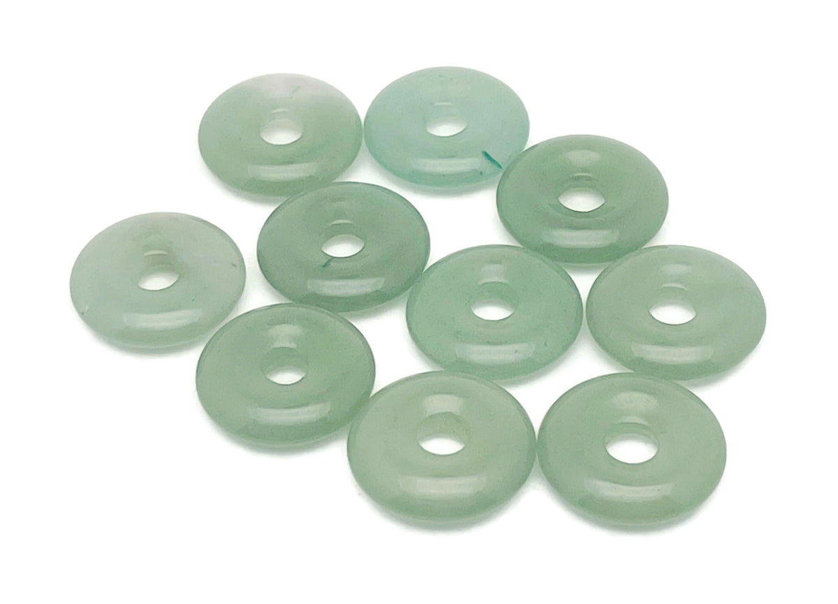 A 20mm aventurine crystal donut pendant with natural green gemstone, featuring a polished, rounded shape and intricate surface details.