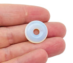 Opalite crystal donut pendant from GemstoneGO, 20mm Pi Stone with smooth, translucent opalite surface and polished finish.