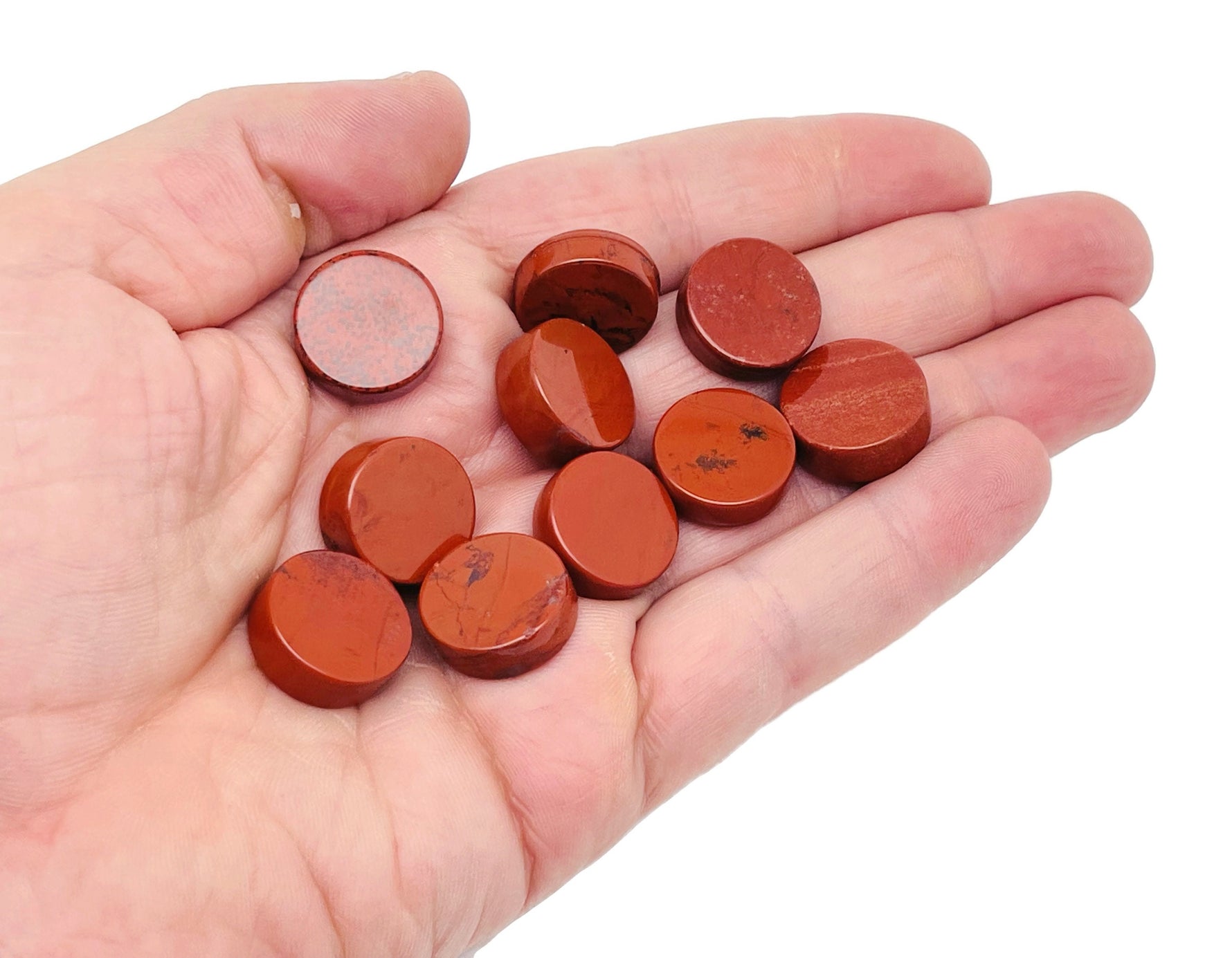 Round red jasper flat gemstone slab from GemstoneGO, showcasing vibrant red color and smooth polished surface.