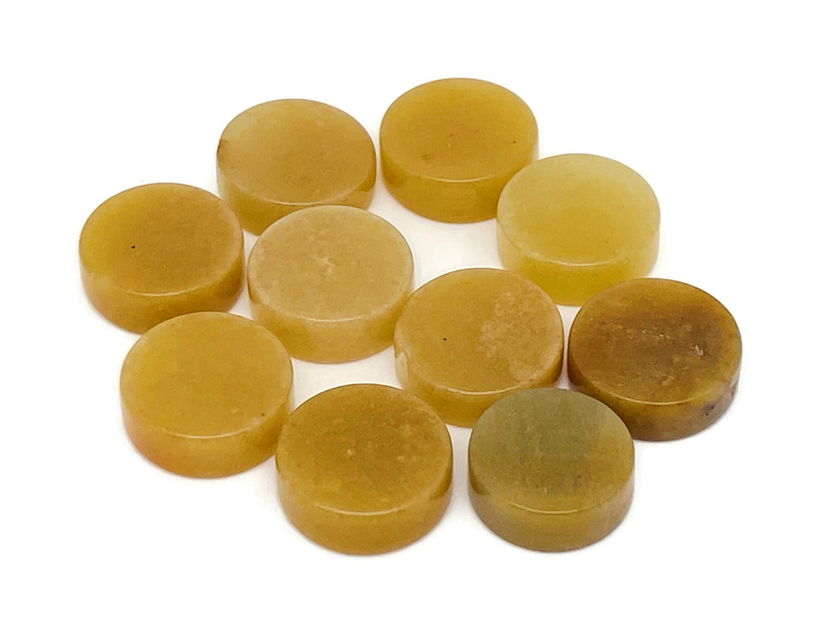 Round yellow jade flat gemstone slab from GemstoneGO, showcasing smooth polished surface and vibrant yellow color.