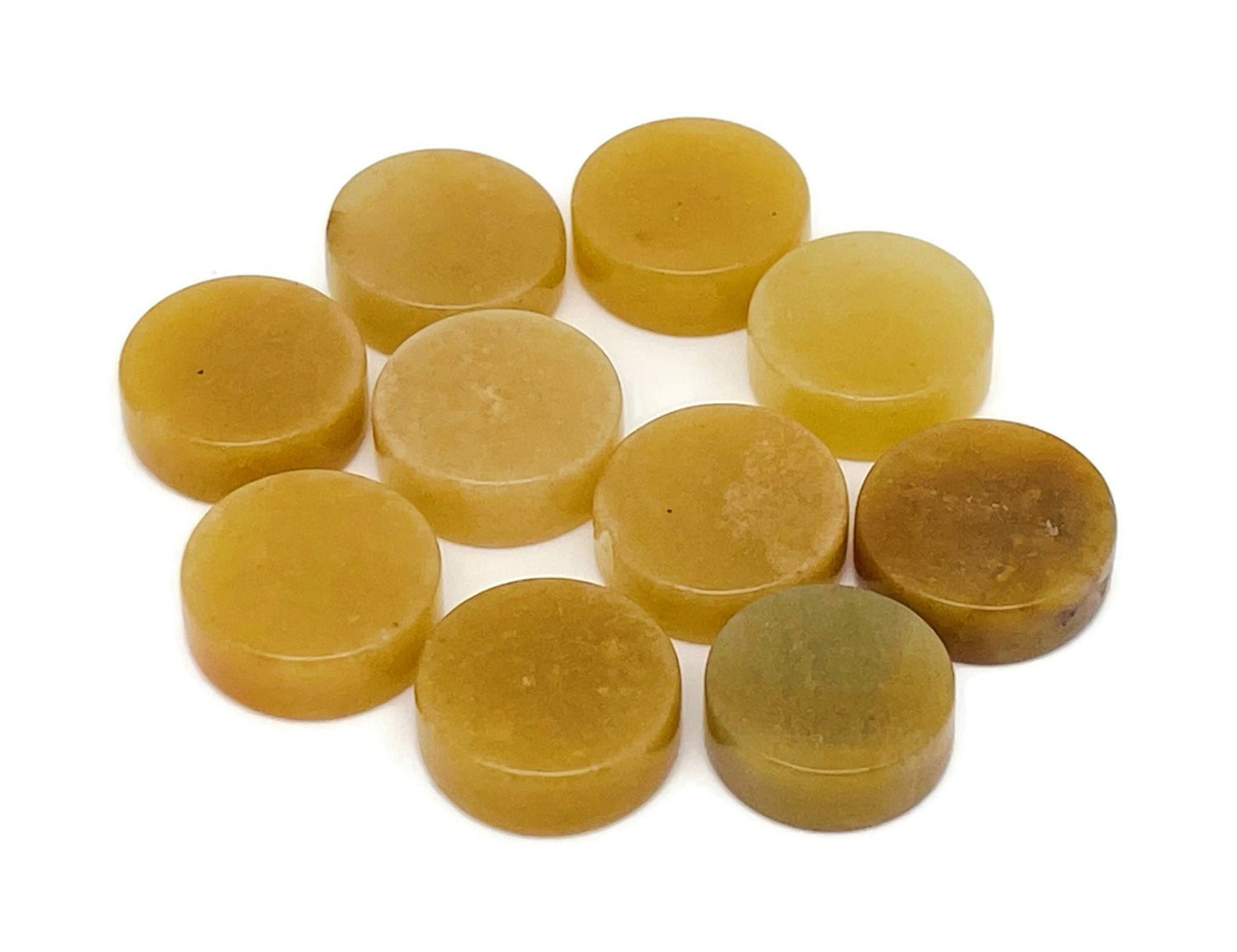 Round yellow jade flat gemstone slab from GemstoneGO, showcasing smooth polished surface and vibrant yellow color.