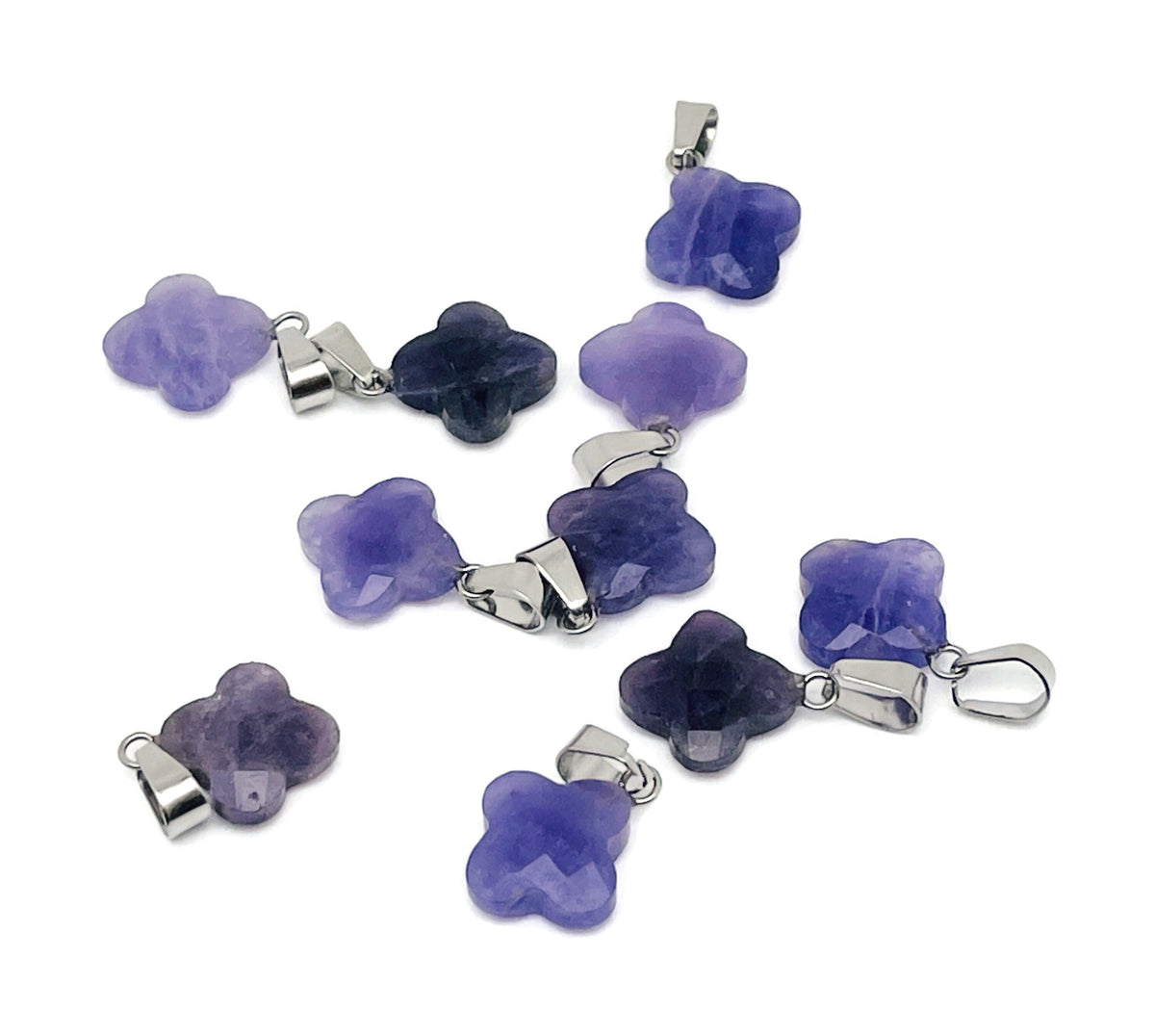 Amethyst four-leaf clover crystal pendant from GemstoneGO, ideal for DIY jewelry making, featuring a purple gemstone charm.