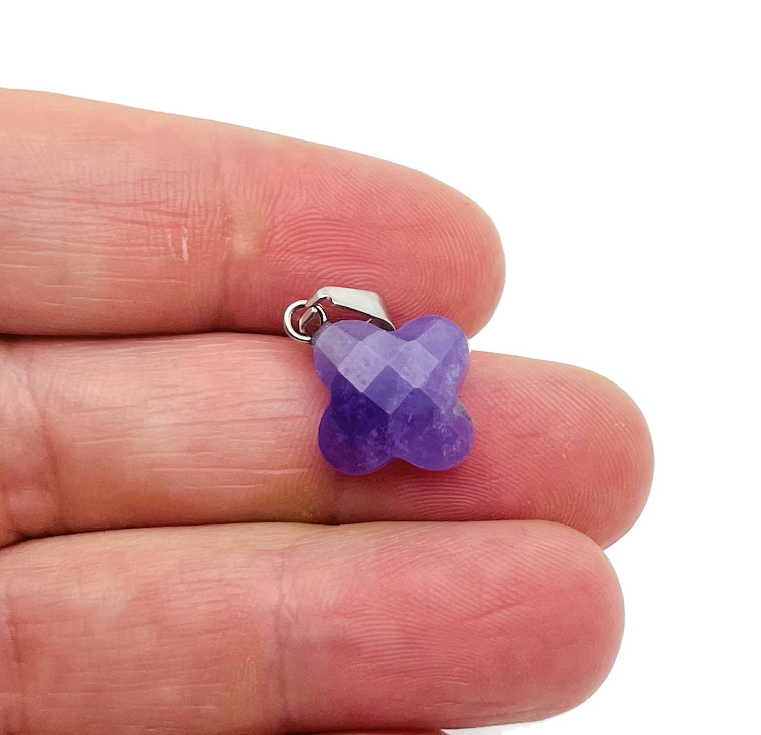 Amethyst four-leaf clover crystal pendant from GemstoneGO, ideal for DIY jewelry making, showcasing a purple gemstone pendant.