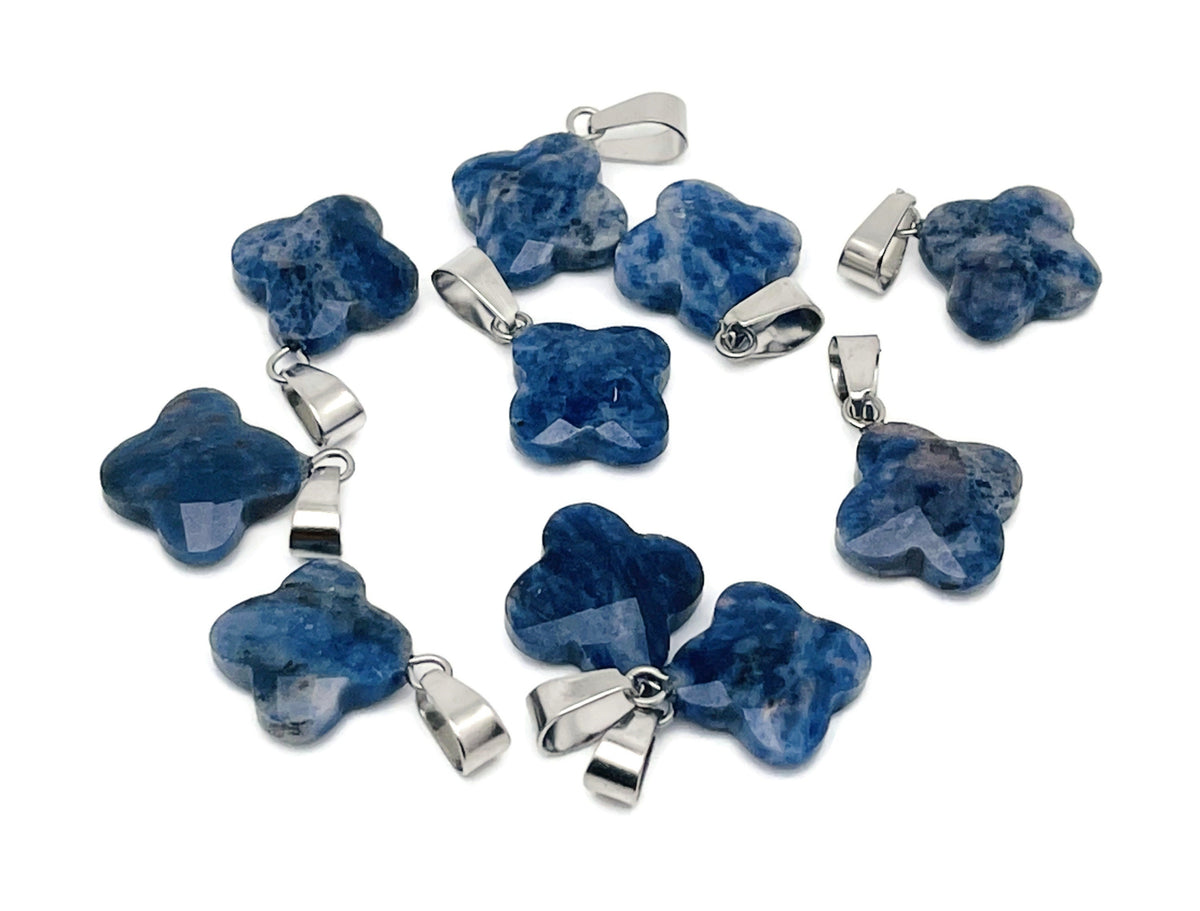 Sodalite four-leaf clover crystal pendant for jewelry making, featuring a blue gemstone with natural veining and silver-tone bail.