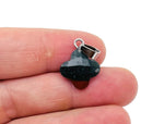 African Bloodstone four-leaf clover crystal pendant from GemstoneGO, showing a vibrant green gemstone with natural inclusions.