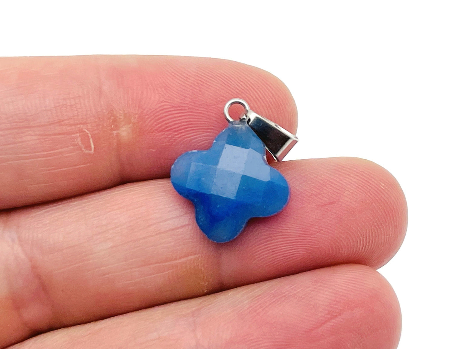 Blue aventurine four-leaf clover crystal pendant from GemstoneGO, ideal for DIY jewelry making, with a polished gemstone appearance.