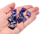 Amethyst triangle gemstone pendant with geometric design by GemstoneGO, showcasing a vibrant purple amethyst stone and silver setting.