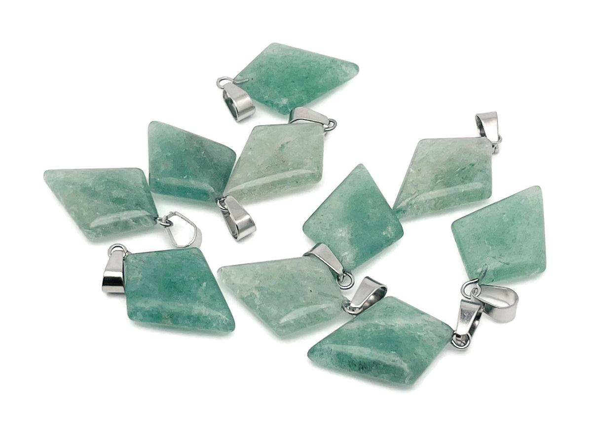 Green strawberry quartz triangle gemstone pendant with geometric design, showcasing vibrant green color and polished surface.