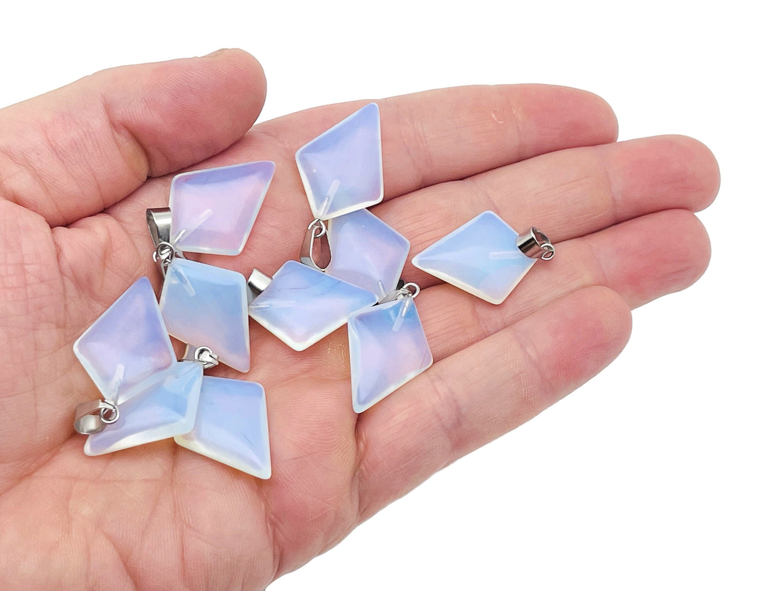 Opalite triangle gemstone pendant from GemstoneGO featuring a geometric design and smooth polished surface.
