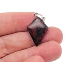 Mahogany Obsidian triangle gemstone pendant with geometric design, showcasing deep reddish-brown and black polished stone.