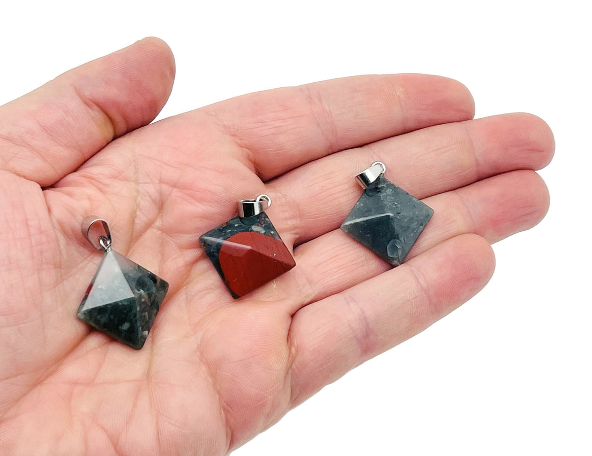 African Bloodstone pyramid gemstone pendant from GemstoneGO, featuring a natural bloodstone carving on a jewelry pendant.