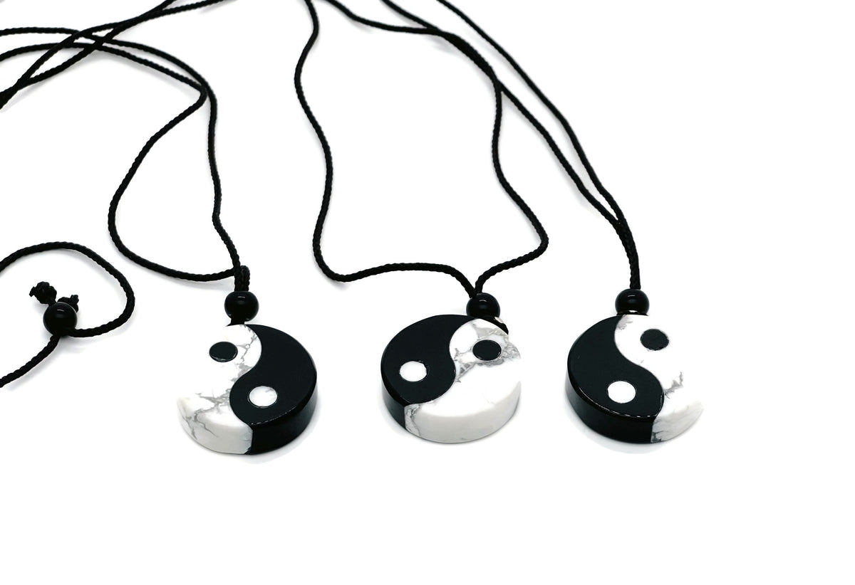 Handmade Yin Yang gemstone necklace featuring Howlite and Obsidian beads, with a yin yang pendant, by GemstoneGO.