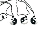 Handmade Yin Yang gemstone necklace featuring Howlite and Obsidian beads, with a yin yang pendant, by GemstoneGO.
