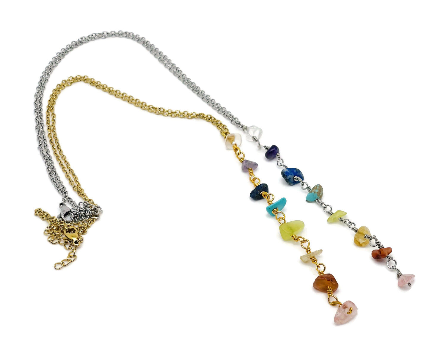 7 Chakra crystal necklace with silver and gold accents, featuring colorful gemstone beads and pendant for spiritual balance.